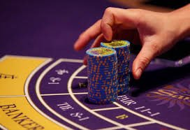 q36 mobile app interface showing sports and casino games on a smartphone